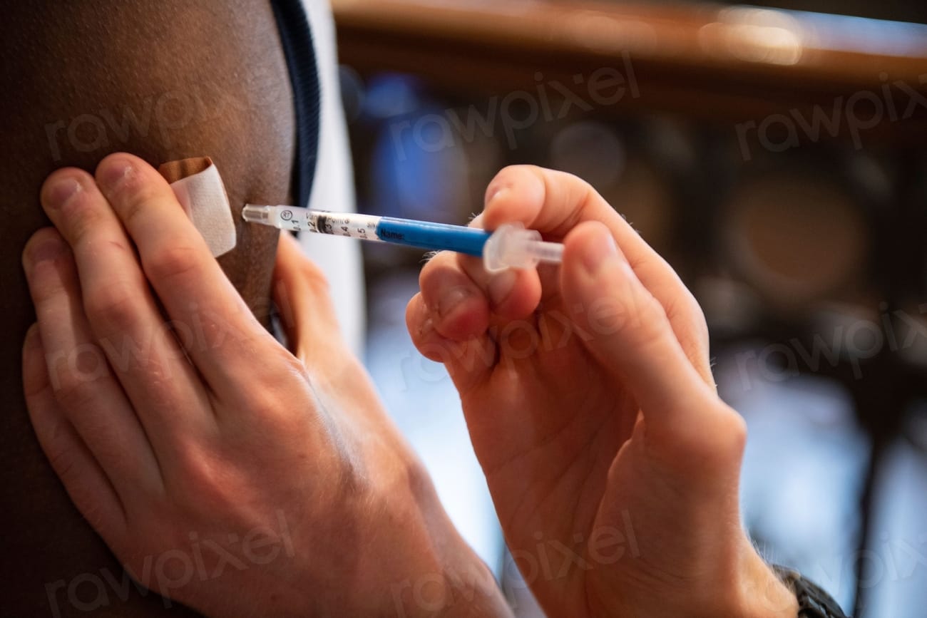 Man receiving COVID-19 vaccine